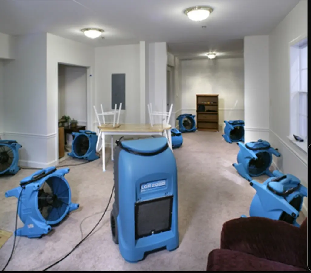 Air movers and dehumidifier setup for Water Damage Restoration in Plainville
